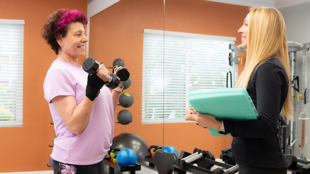 senior woman in the gym at the village